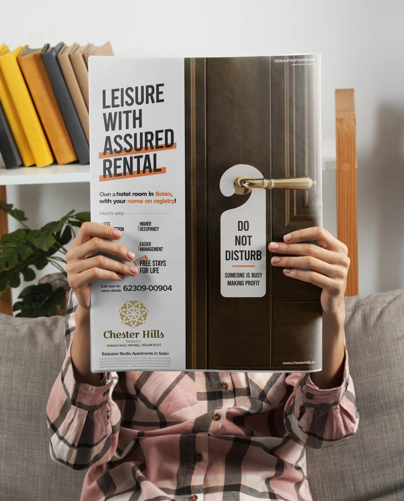 Newspaper advertisement held open